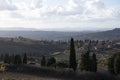 Panoramic view on hills near Pienza, Tuscany, Italy. Tuscan landscape with cypress trees, vineyards, forests and ploughed fields Royalty Free Stock Photo