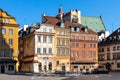 Panoramic view of historic colorful tenement houses at Royal Castle Square - Plac Zamkowy - in Starowka Old Town quarter of Warsaw Royalty Free Stock Photo