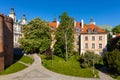 Panoramic view of historic tenement houses at Mostowa street of Starowka Old Town quarter with Church of Holy Spirit in background Royalty Free Stock Photo