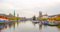 Panoramic view of historic Zurich city center with famous Fraumunster and Grossmunster Churches and river Limmat at Lake Royalty Free Stock Photo