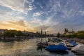 Panoramic view of historic Zurich downtown with Fraumunster and Grossmunster churches at lake zurich during sunset, Switzerland