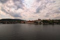 Panoramic view of historical center of Prague, Charles Bridge and Vltava river, Saint Vitus Cathedral at cloudy summer day Royalty Free Stock Photo