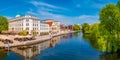 Panoramic view of historical downtown in Potsdam with river Havel and cafes and restaurants at blue sky in Spring, Germany