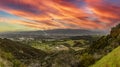 Panoramic view from the Hollywood Mountain of Griffith Park under a beautiful orange sky, in the city of Los Angeles. Royalty Free Stock Photo