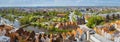 Panoramic view of the Holsten Gate in Luebeck, old bricks building and river. Aerial view