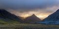 Panoramic view of Icelandic mountains with dramatic cloud cover during sunset at east coast of Iceland Royalty Free Stock Photo