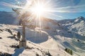 Panoramic view Idalp skiing area with many ski slope, pistes, ski chairlifts gondola against mountain landscape and Royalty Free Stock Photo