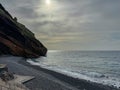 Garajau - Panoramic view of idyllic volcanic black stone beach of Praia Garajai, Canico, Madeira island, Portugal, Europe Royalty Free Stock Photo