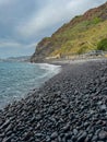 Garajau - Panoramic view of idyllic volcanic black stone beach of Praia Garajai, Canico, Madeira island, Portugal, Europe Royalty Free Stock Photo