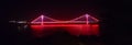Panoramic view of an illuminated glowing red bridge over the water in Istanbul, Turkey Royalty Free Stock Photo