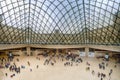 Panoramic view of inside the Louvre pyramid in Paris Royalty Free Stock Photo