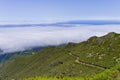 Panoramic view of an isolated mountain road above clouds Madeira Island, Portugal Royalty Free Stock Photo