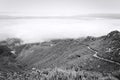 Panoramic view of an isolated mountain road above clouds Madeira Island, Portugal Royalty Free Stock Photo