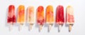 Panoramic view of isolated orange and strawberry popsicles on a white background. Generative AI Royalty Free Stock Photo