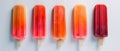 Panoramic view of isolated orange and strawberry popsicles on a white background. Generative AI Royalty Free Stock Photo