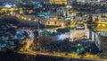 Panoramic view on Jerusalem night timelapse with traffic on the road from the Mount of Olives. Royalty Free Stock Photo