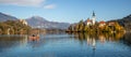 Panoramic view of Julian Alps, Lake Bled with St. Marys Church of the Assumption on the small island. Bled, Slovenia Royalty Free Stock Photo