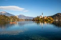 Panoramic view of Julian Alps, Lake Bled with St. Marys Church of the Assumption on the small island. Bled, Slovenia Royalty Free Stock Photo