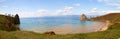 Panoramic view of Khuzhir Bay and cape Burhan, Shamanka or Shaman Rock. Lake Baikal, Olkhon Island in summer Royalty Free Stock Photo