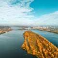 Panoramic view of Kiev city with the Dnieper River and a large orange park area in the middle . Aerial view Royalty Free Stock Photo