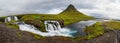 Panoramic view of Kirkjufellfoss and Kirkjufell mountain in cloudy day ,Iceland. Royalty Free Stock Photo