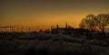 Panoramic view of Kronborg Castle and a silhouette at sunrise, Elsinore, Denmark