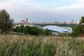 Panoramic view from the Krylatskie Hills park to the cycle track, ice palace and picturesque bridge. Evening view of Moscow.