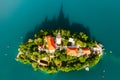 Panoramic view of Lake Bled with Assumption of Maria Church on island on the background of Julian Alps mountains in Royalty Free Stock Photo