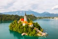 Panoramic view of Lake Bled with Assumption of Maria Church on island on the background of Julian Alps mountains in Royalty Free Stock Photo