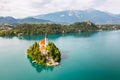 Panoramic view of Lake Bled with Assumption of Maria Church on island on the background of Julian Alps mountains in Royalty Free Stock Photo