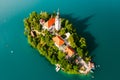 Panoramic view of Lake Bled with Assumption of Maria Church on island on the background of Julian Alps mountains in Royalty Free Stock Photo