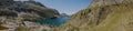 Panoramic view of lake Colombo basin and dam on the Bergamo Alps