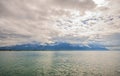 Panoramic view of Lake Geneva, one of Switzerland`s most cruised lakes in Europe, with sky full of clouds after the rain