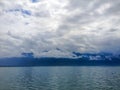 Panoramic view of Lake Geneva, one of Switzerland`s most cruised lakes in Europe, with sky full of clouds after the rain Royalty Free Stock Photo