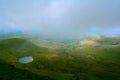 A panoramic view at the lake in the hills (Llyn Cwm Llwch) near Pen y Fan peak, Brecon Beacons , Wales, UK Royalty Free Stock Photo
