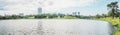 Panoramic view of the lake of a park on a beautiful sunny day. Royalty Free Stock Photo