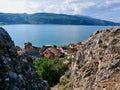 Panoramic view of lakeside village Lin, Albania, Lake Ohrid in the background.