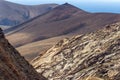 Panoramic view at landscape between Betancuria and Pajara  on Fuerteventura with multi colored volcanic mountains Royalty Free Stock Photo