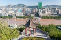 Panoramic view of Lanzhou China with a traditional temple in the foreground