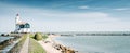 Panoramic view of lighthouse on coast of Marken, Netherlands Royalty Free Stock Photo