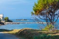 Panoramic view of the lighthouse on the Licoasa island and the pier