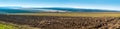 Panoramic view of lines on big ploughland field
