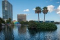 Panoramic view of little island with palms and Walt Disney Amphitheater on Lake Eola Park at downtown area 2 Royalty Free Stock Photo
