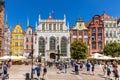 Panoramic view of Long Market - Dlugi Rynek - boulevard in old town city center with Neptune Fountain and Artus Court in Gdansk,