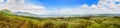 Panoramic view of lough Leane with Ross Island in horizon and the slopes of Mount Mangerton  on a sunny foggy summer morning Royalty Free Stock Photo