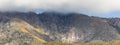 Panoramic view of low clouds over autumn mountain landscape Royalty Free Stock Photo