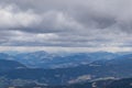 Panoramic view of Lower Tauern (Niedere Tauern) and Seckauer Alps seen from Saualpe, Lavanttal Alps. Rain storm incoming