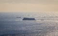 Panoramic view on the Maltese Island Filfla with a transportation Ship in the near. Clear Sea on the horizon