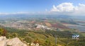 Panoramic view from Manara Cliff on Hula Valley. Kiryat Shmona city  and beautiful farming landscape with agricultural land Royalty Free Stock Photo