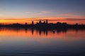 Mantua old city skyline silhouette reflecting in the waters of Lower Lake during sunset Royalty Free Stock Photo
